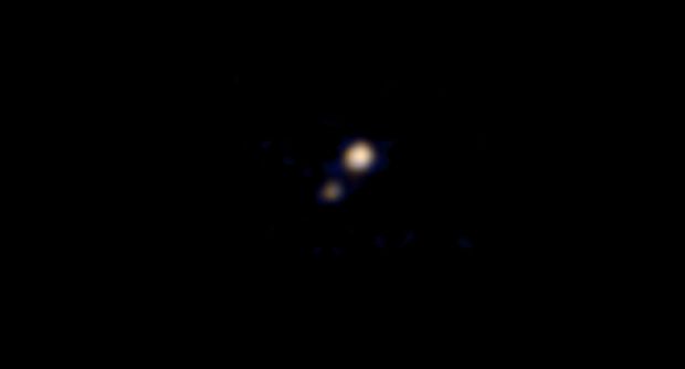 Карликовая планета Плутон и ее спутник Харон / NASA Карликовая планета Плутон и ее спутник Харон / NASA